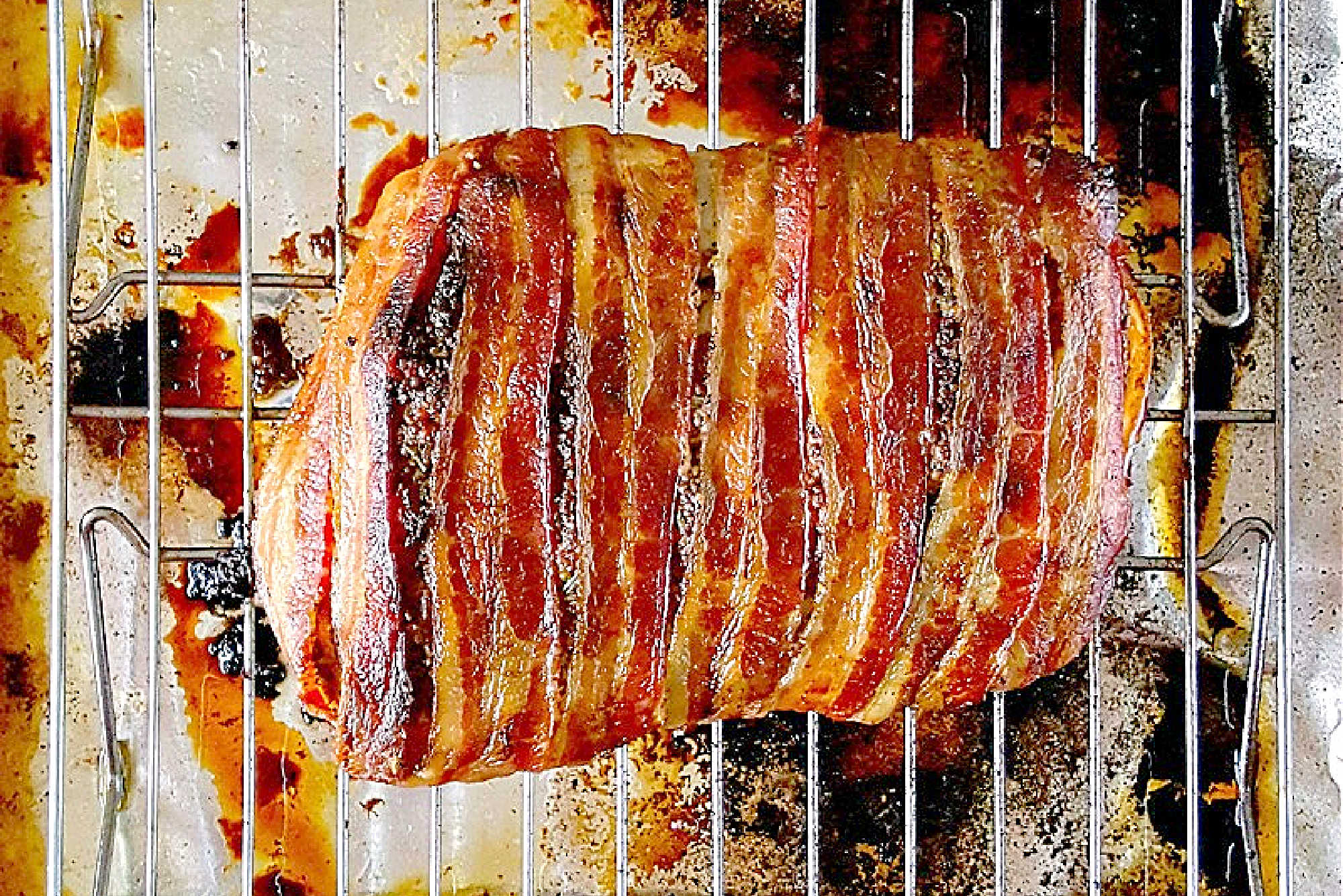 Experience layers of flavor with our Bacon Wellington Pork Roast, where savory bacon wraps perfectly seasoned pork tenderloin for an unforgettable meal. Indulge in the ultimate comfort food.  #OurFamilyTable #BaconWellington #PorkRoast #DeliciousDinner #FoodieFaves #WeeknightMeals