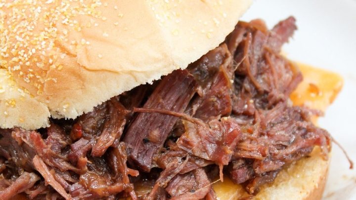 My Slow Cooker Hot Beef Sandwiches are perfect for an easy weeknight meal. Tender beef seasoned, slow cooked, and shredded .