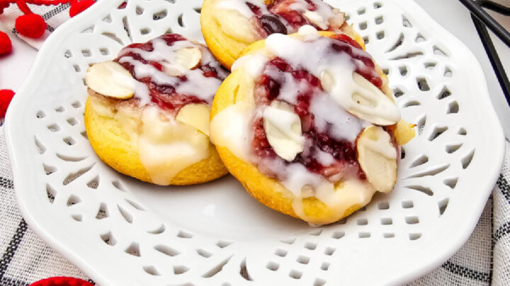 Raspberry Cream Cheese Crescent Cookies are buttery, soft, and filled with sweet cream cheese and raspberry jam. Easy, festive, and delicious.