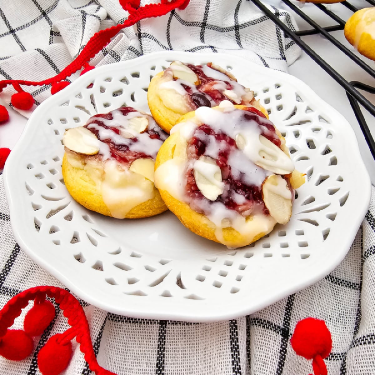 Raspberry Cream Cheese Crescent Cookies are buttery, soft, and filled with sweet cream cheese and raspberry jam. Easy, festive, and delicious.
