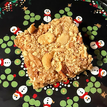 These cookie bars are chock-full of nuts in the batter and on top.  They are sure to please the nut lover on your Christmas list.