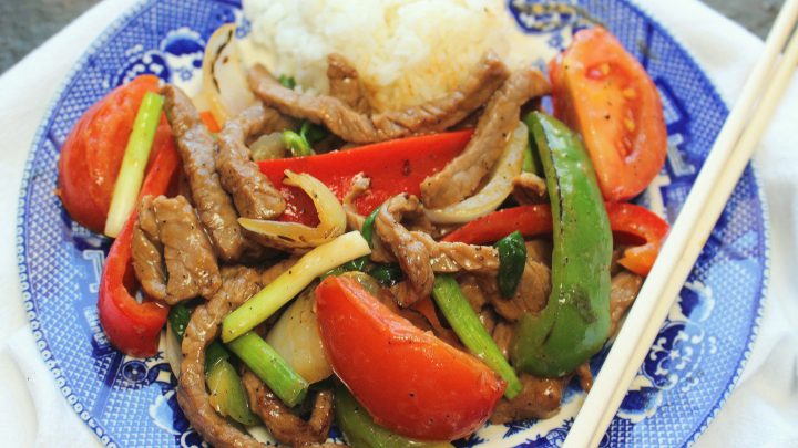 Pepper Steak is a retro classic beef stir-fry with a flavorful sauce,  peppers and  tomatoes. Perfect over  rice.
