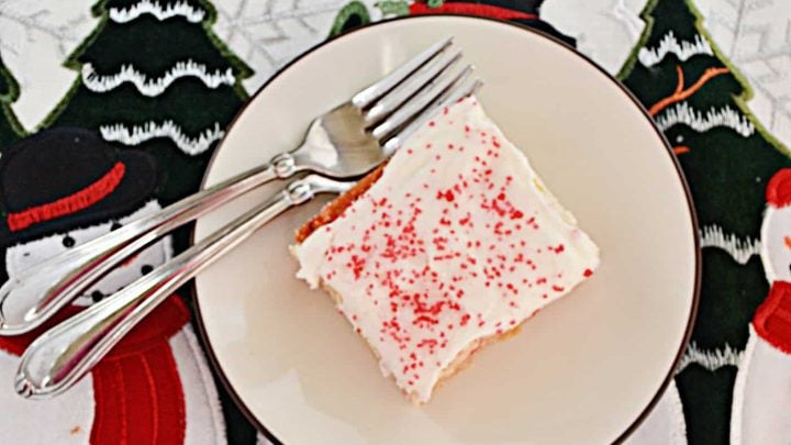 This holiday season make soft and tasty peppermint studded sugar cookie bars topped with peppermint buttercream and sparkling peppermint sugar on top.