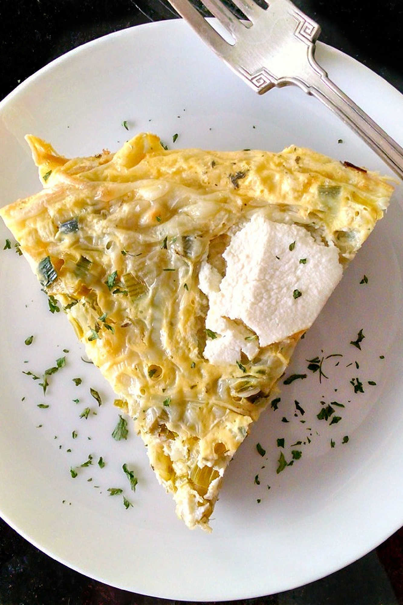 Leftover spaghetti just met its match in this ricotta pasta frittata, perfect for those laidback brunches or easy dinners that bring everyone together. Try making it for your next at-home gathering and watch how quickly it disappears. #RicottaPastaFrittata #PastaFrittata #ItalianBrunch #EggcellentEats #CheesyGoodness #PastaFrittataRecipe #ItalianEggDish #EasyWeeknightMeal #SavoryBreakfastIdeas
