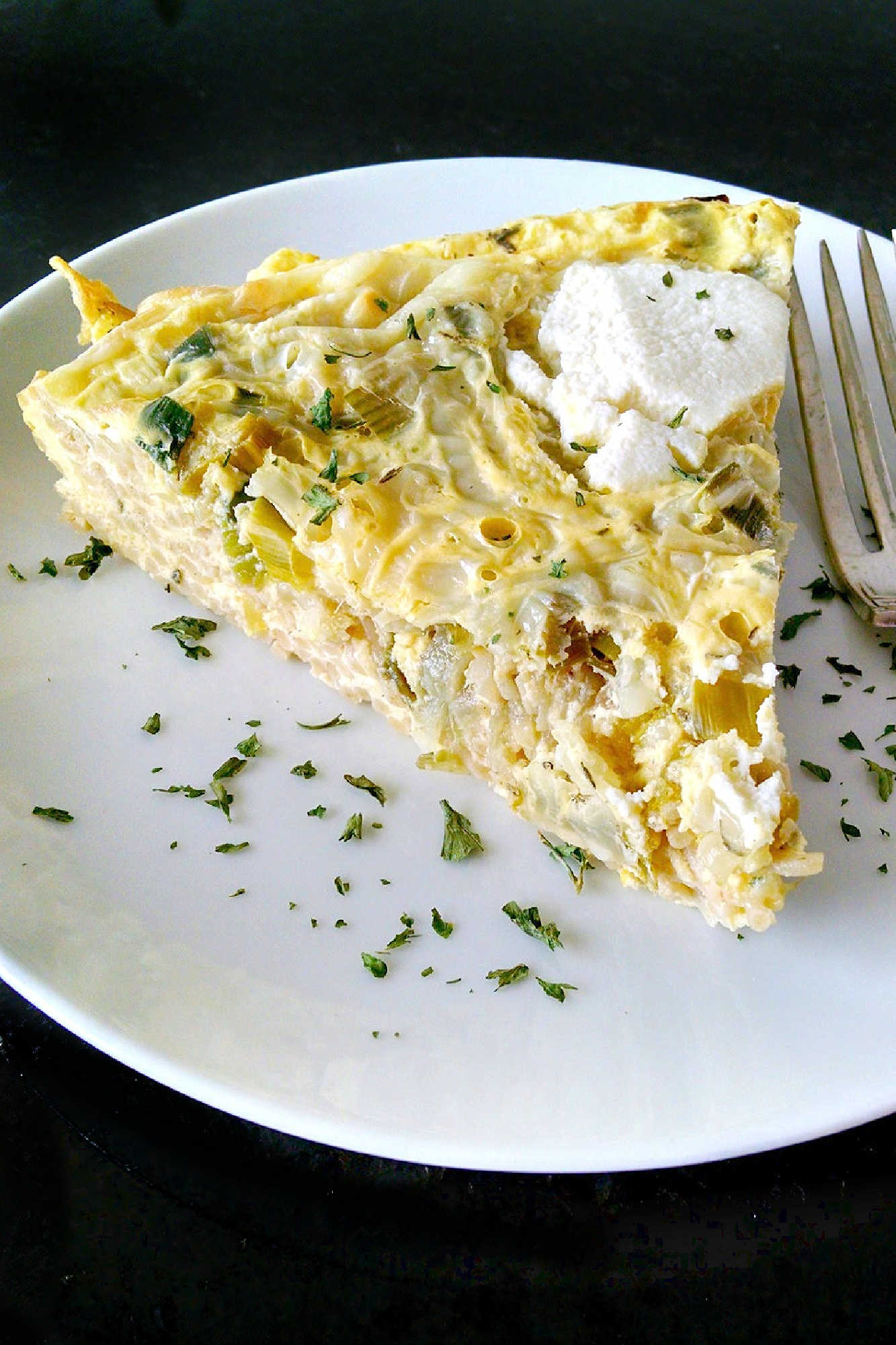 Leftover spaghetti just met its match in this ricotta pasta frittata, perfect for those laidback brunches or easy dinners that bring everyone together. Try making it for your next at-home gathering and watch how quickly it disappears. #RicottaPastaFrittata #PastaFrittata #ItalianBrunch #EggcellentEats #CheesyGoodness #PastaFrittataRecipe #ItalianEggDish #EasyWeeknightMeal #SavoryBreakfastIdeas