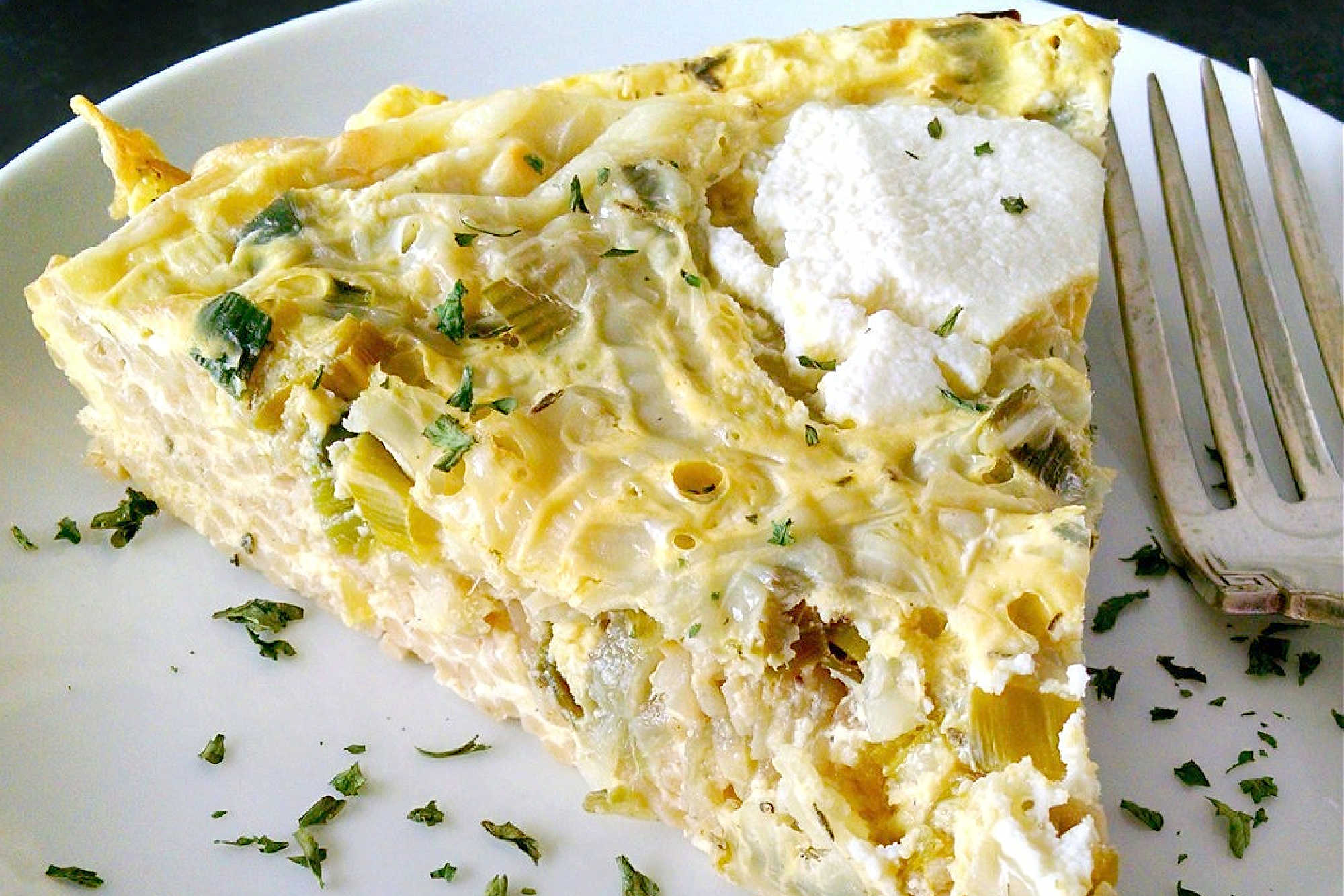 Leftover spaghetti just met its match in this ricotta pasta frittata, perfect for those laidback brunches or easy dinners that bring everyone together. Try making it for your next at-home gathering and watch how quickly it disappears. #RicottaPastaFrittata #PastaFrittata #ItalianBrunch #EggcellentEats #CheesyGoodness #PastaFrittataRecipe #ItalianEggDish #EasyWeeknightMeal #SavoryBreakfastIdeas