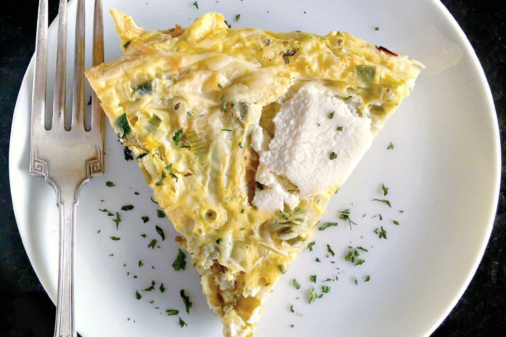 Leftover spaghetti just met its match in this ricotta pasta frittata, perfect for those laidback brunches or easy dinners that bring everyone together. Try making it for your next at-home gathering and watch how quickly it disappears. #RicottaPastaFrittata #PastaFrittata #ItalianBrunch #EggcellentEats #CheesyGoodness #PastaFrittataRecipe #ItalianEggDish #EasyWeeknightMeal #SavoryBreakfastIdeas