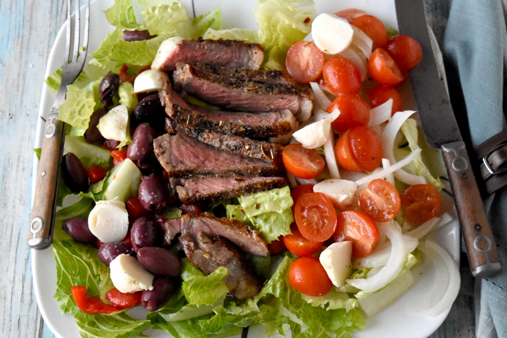Healthy eating doesn't have to be boring. With steak Caprese salad, you blend freshness and protein into a dish that feels like a treat after a long day. #OurFamilyTable #SteakCapreseSalad #SaladLoversUnite #FoodieFinds #GourmetGrub #Foodie #ItalianDelight #SteakCapreseSalad #SteakLovers #HealthyEats #FoodieFavs #SummerSaladSensation #ResolutionRecipe
