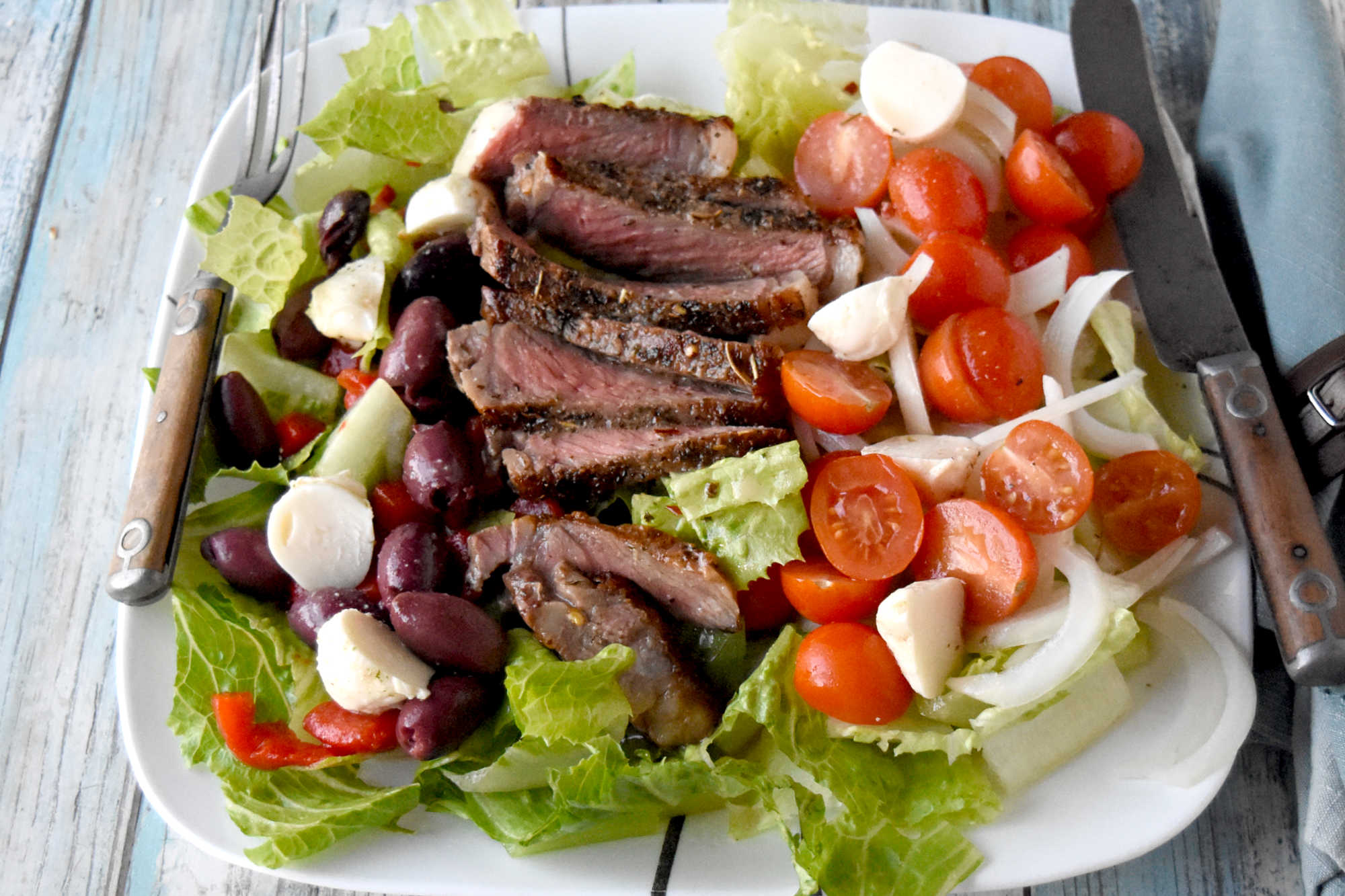 Healthy eating doesn't have to be boring. With steak Caprese salad, you blend freshness and protein into a dish that feels like a treat after a long day. #OurFamilyTable #SteakCapreseSalad #SaladLoversUnite #FoodieFinds #GourmetGrub #Foodie #ItalianDelight #SteakCapreseSalad #SteakLovers #HealthyEats #FoodieFavs #SummerSaladSensation #ResolutionRecipe