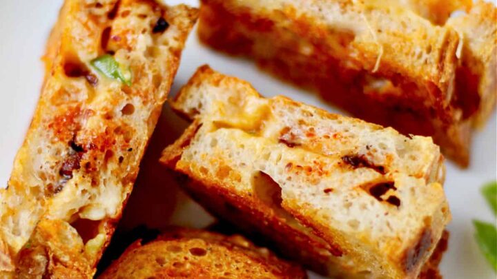 This chili crisp grilled cheese sandwich is the way to take a grilled cheese sandwich to the next level. You'll never have "regular" grilled cheese again.