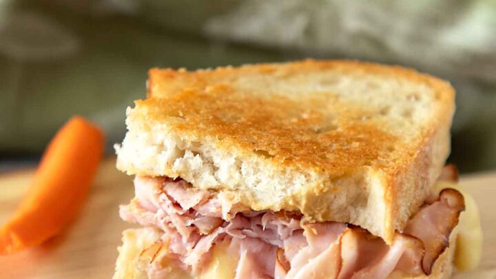 With savory ham, creamy cheese and a bit of mustard, a Grilled Ham and Cheese Sandwich is classic comfort food for a family friendly lunch.