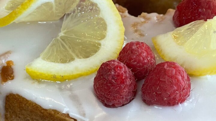 Lemon Raspberry Pound Cake is a moist cake topped with a tart lemon glaze, sweet ripe raspberries and thin slices of juicy lemon.