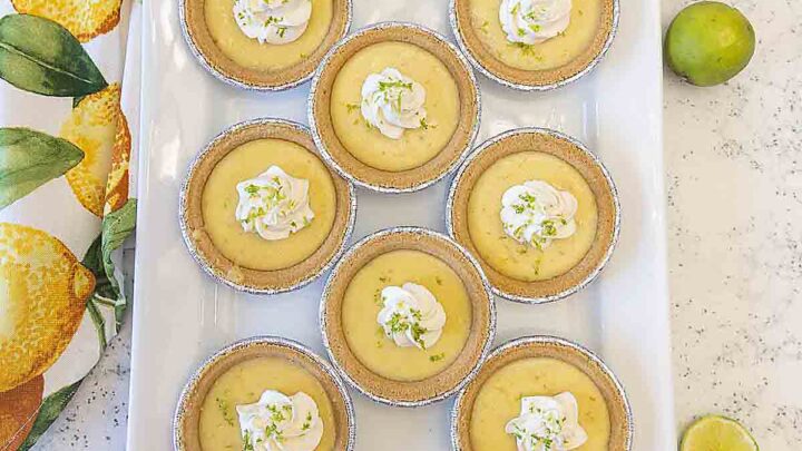 Mini Key Lime Pie is a special treat--and it's deceptively easy to make!  With or without meringue, it's perfect for Pi Day, or any time.