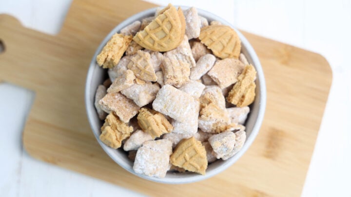 This Nutter Butter Puppy Chow is out-of-this-world delicious! Package in cellophane bags to give as gifts or serve in bowls for parties.