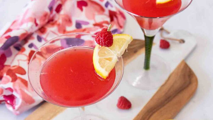 Sweet, tart and fruity, this Raspberry Lemon Drop Martini is a tasty way to brighten up your spring.  It even looks cheery!