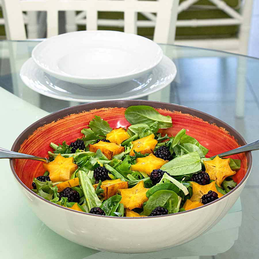 Blackberries, starfruit and salad greens pair with fresh passionfruit dressing in this tasty Moon and Starfruit Tropical Salad.