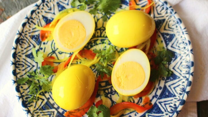 Amish Pickled Mustard Eggs marinate hard  cooked  eggs in a savory brine  for a flavor somewhat like deviled eggs.