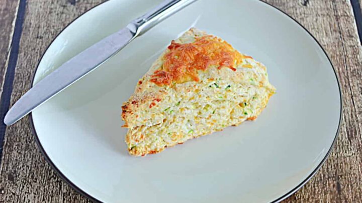 Zucchini Cheddar Scones are savory scones filled with sharp cheddar cheese and zucchini for a tasty bread that's loaded with veggies!