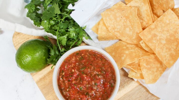 Blender Salsa is made with fresh tomatoes, cilantro, onion lime, jalapeno and seasoning. All made in a blender or food processor!