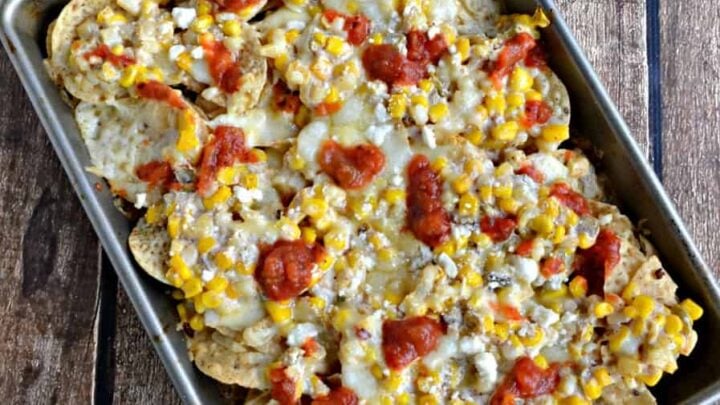 Looking for the ultimate loaded nachos for an appetizer or snack? Check out my vegetarian Mexican Street Corn Nachos with two types of cheese!