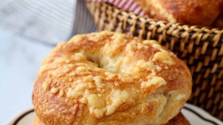 These Asiago Cheese Bagels are both stuffed and topped with melted cheese. Bread and melted cheese.... doesn't that sound magical?