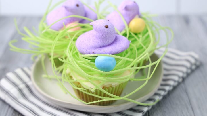 A few simple additions and you can turn plain cupcakes into these adorable Peeps Birds Nest Cupcakes perfect for Easter.