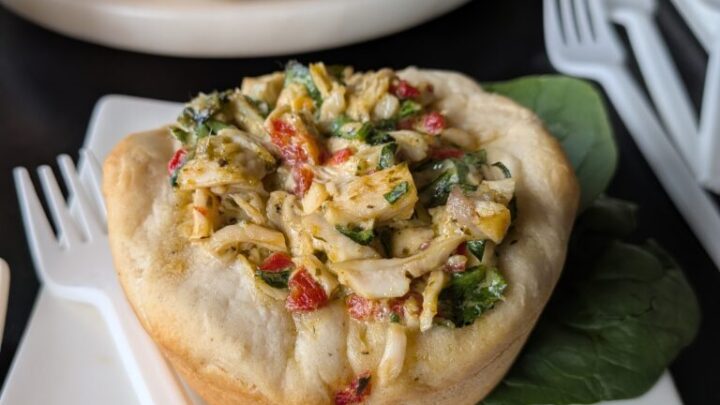 Pesto Chicken Salad Cups bake creamy pesto chicken inside flaky biscuits. A great light choice for brunch!