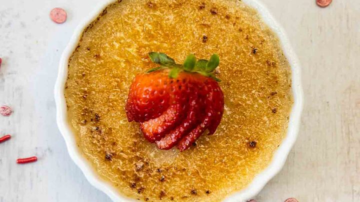 Strawberry Creme Brulee is silky smooth custard, lightly flavored with strawberry and topped with a crunchy caramelized sugar topping.