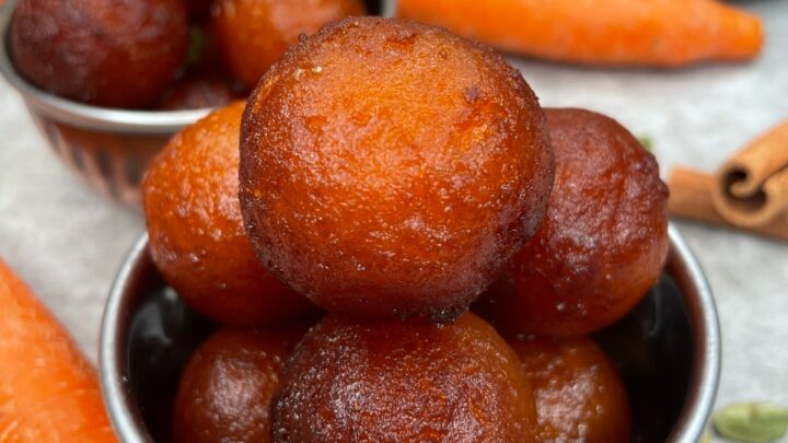 Soft and melt in the mouth carrot jamun infused with carrots and soaked in a cardamom-cinnamon syrup is a delicghtful twist on the calssic gulab jamun. Serve these for any occassion, for your upcoming Easter celebreations too.