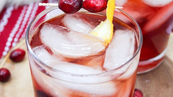 Cranberry Old Fashion is a twist on an supper club favorite. Brandy, sugar, bitters, and cranberry juice make a delicious winter drink.
