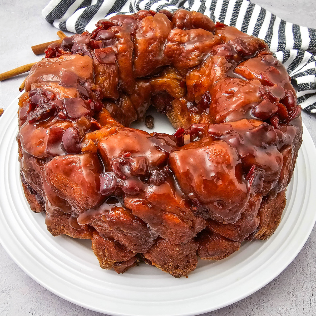 Maple Bacon Monkey Bread is an easy, pull-apart breakfast recipe made with biscuits, bacon, and a maple glaze for the perfect brunch dish.