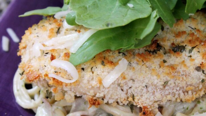 This oven-fried chicken with prosciutto, arugula and pesto-asiago cream sauce is a lighter version of the popular dish “Chicken Bellagio”.