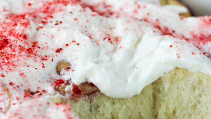 Soft Strawberry Cheesecake Rolls filled with sweet berries and topped with cream cheese frosting. Perfect for brunch, breakfast, or dessert.