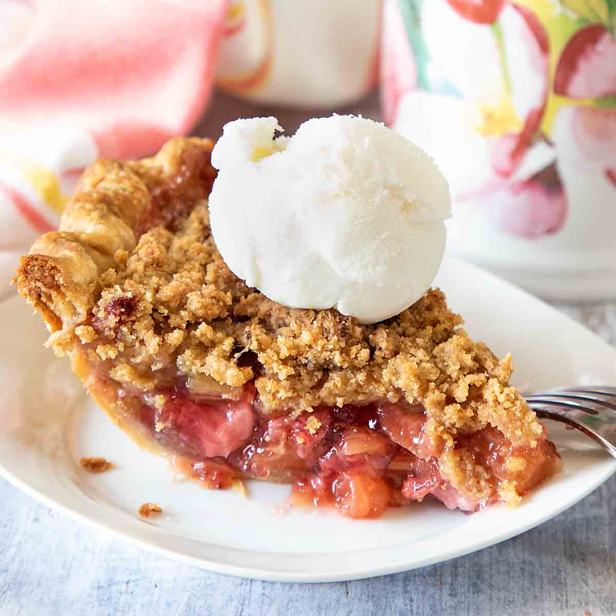 Sweet, tart and fruity, with a rich crumble topping, Strawberry Rhubarb Pie is a tasty dessert that welcomes the growing season.