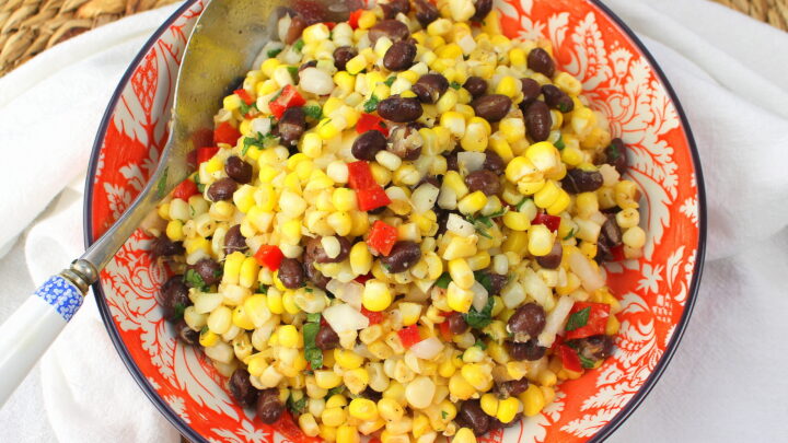 Simple and colorful fresh corn salad with a splash of black beans celebrates the height of summer with local foods from the Farmer’s market.
