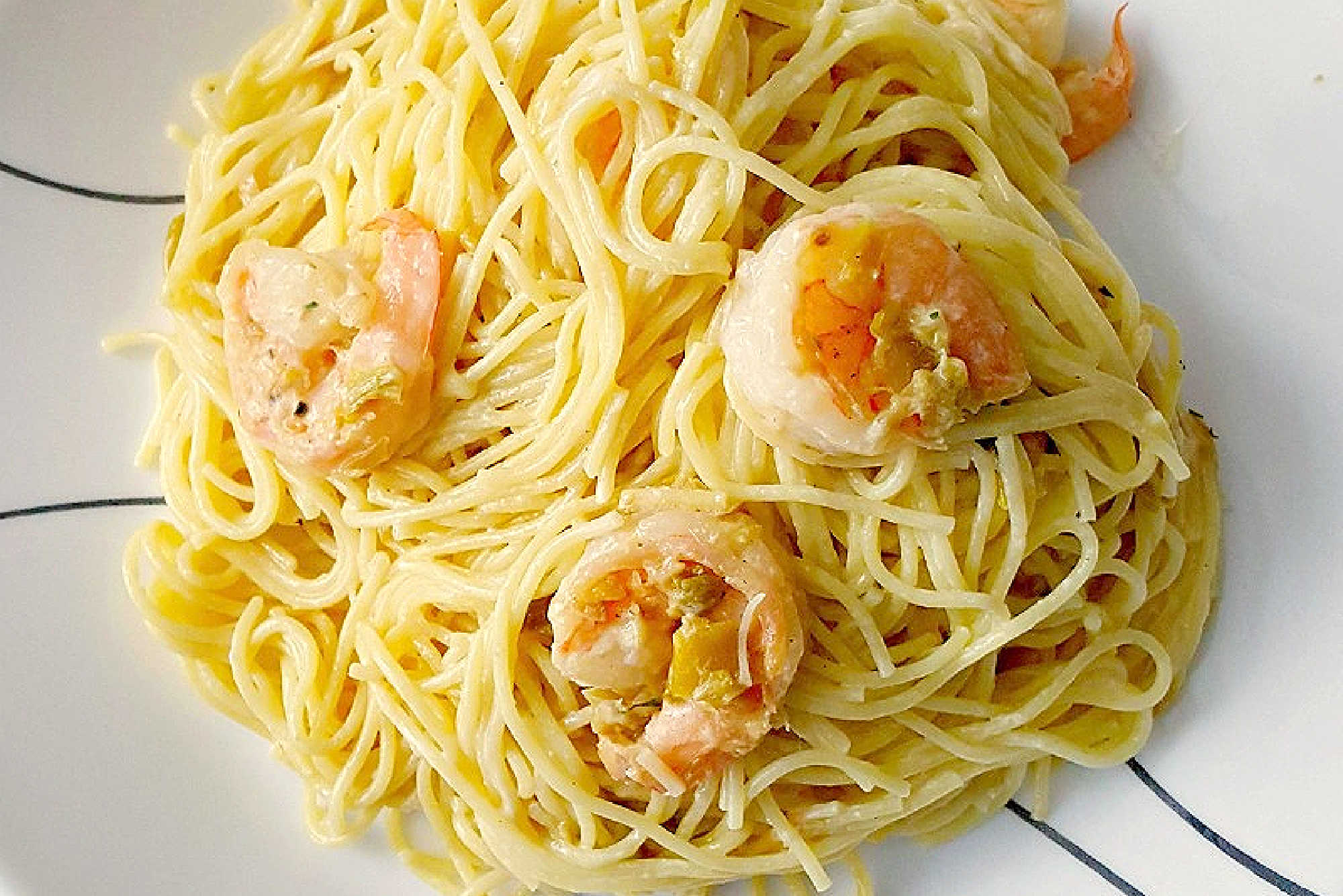 Shrimp and leeks add a savory pop to classic Pasta Carbonara, bringing together velvety sauce, al dente pasta, and fresh flavors in one dish. Ready to try something new? Save this recipe for your next dinner inspiration. #ShrimpCarbonara #PastaCarbonara #SeafoodPasta #ShrimpPasta #CarbonaraRecipe #LeeksRecipe #CreamyPasta #EasyDinnerRecipe #HomemadePasta #WeeknightDinner #DateNightDinner #FoodBlogRecipe #PastaCarbonara #LeekLovers #ItalianFoodie #HomeCookingDelight
