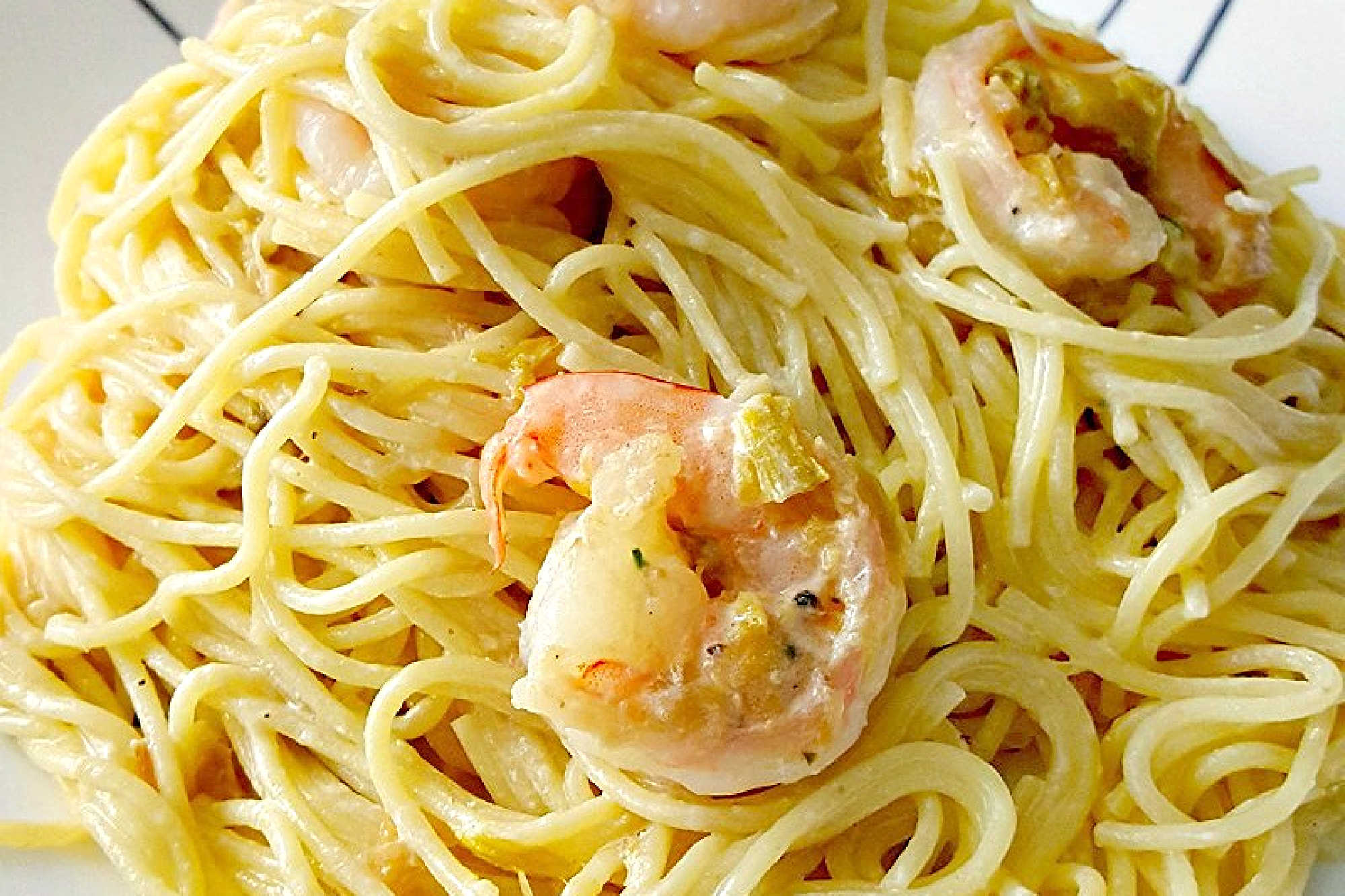 Shrimp and leeks add a savory pop to classic Pasta Carbonara, bringing together velvety sauce, al dente pasta, and fresh flavors in one dish. Ready to try something new? Save this recipe for your next dinner inspiration. #ShrimpCarbonara #PastaCarbonara #SeafoodPasta #ShrimpPasta #CarbonaraRecipe #LeeksRecipe #CreamyPasta #EasyDinnerRecipe #HomemadePasta #WeeknightDinner #DateNightDinner #FoodBlogRecipe #PastaCarbonara #LeekLovers #ItalianFoodie #HomeCookingDelight