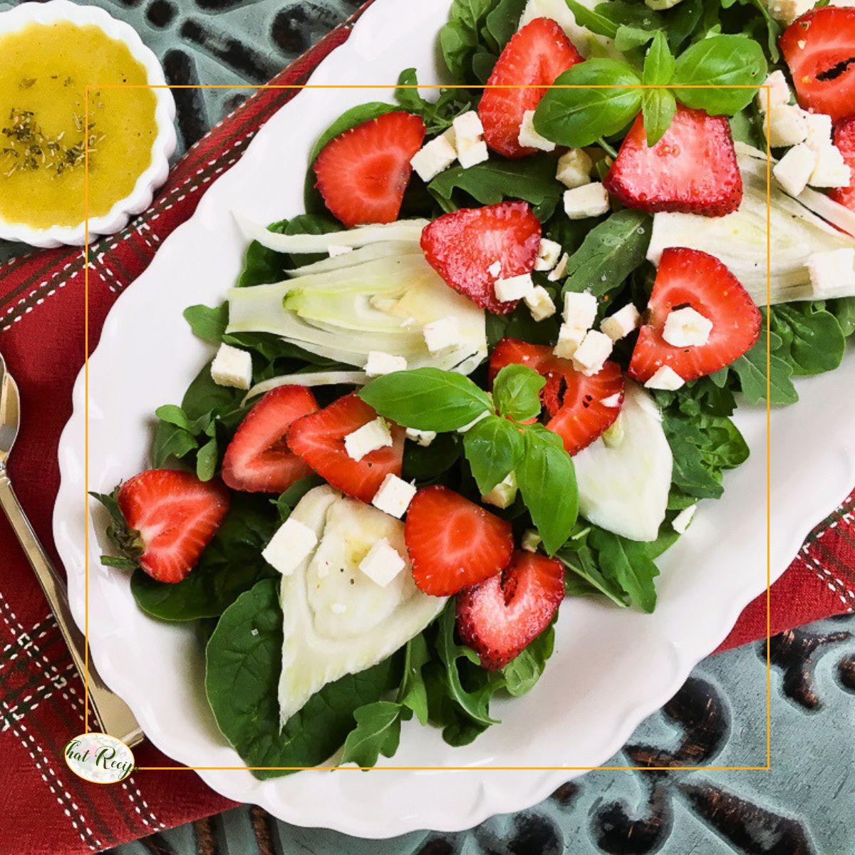 Strawberry Fennel salad is a colorful blend of favors from sweet strawberries, mild licorice from fennel, peppery arugula and creamy feta. Top it with an easy homemade Italian dressing for a simple showstopping salad.