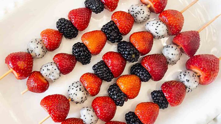 Pretty in red, white and blue, these 4th of July Fruit Kabobs are a perfect family snack or dessert. Serve with a cream cheese yogurt dip for even more fun.