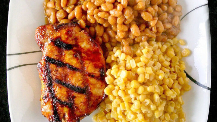 A twist on traditional barbecue sauce, this one replaces the tomato products with mustard. It’s spicy, vinegar-y kick is perfect with the sweet molasses. Mustard Barbecue Chops is our new fave summer meal! #getgrilling #porkchop #grilledchop #mustardsauce #barbecuesauce #MustardBBQChops #FlavorfulChops #SauceUpYourChops #PorkPerfection