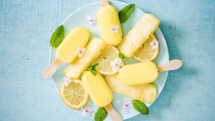These frozen pineapple yogurt pops are so light and refreshing. Quick and easy to make! Perfect for summer!