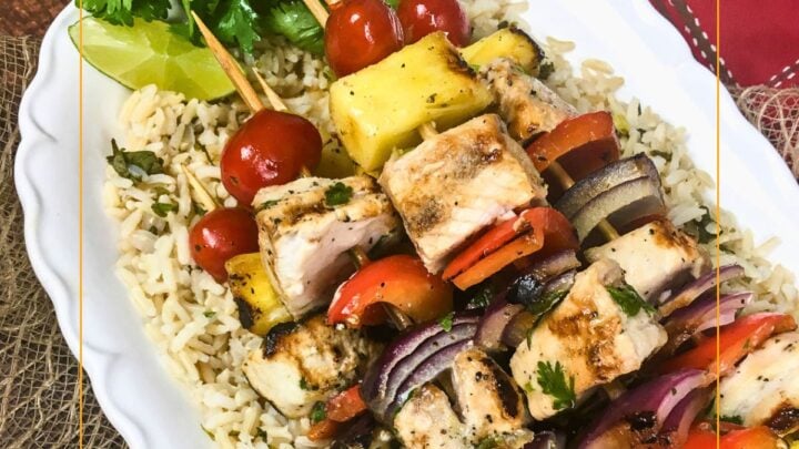 Pineapple Swordfish Skewers pair fresh healthy flavors like pineapple and lime with swordfish on a quick cooking fun to eat skewer.