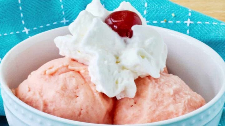 This pink pineapple sherbet is so refreshing and sweet. Enjoy it in a bowl or an ice cream cone. It's a wonderful treat any season.