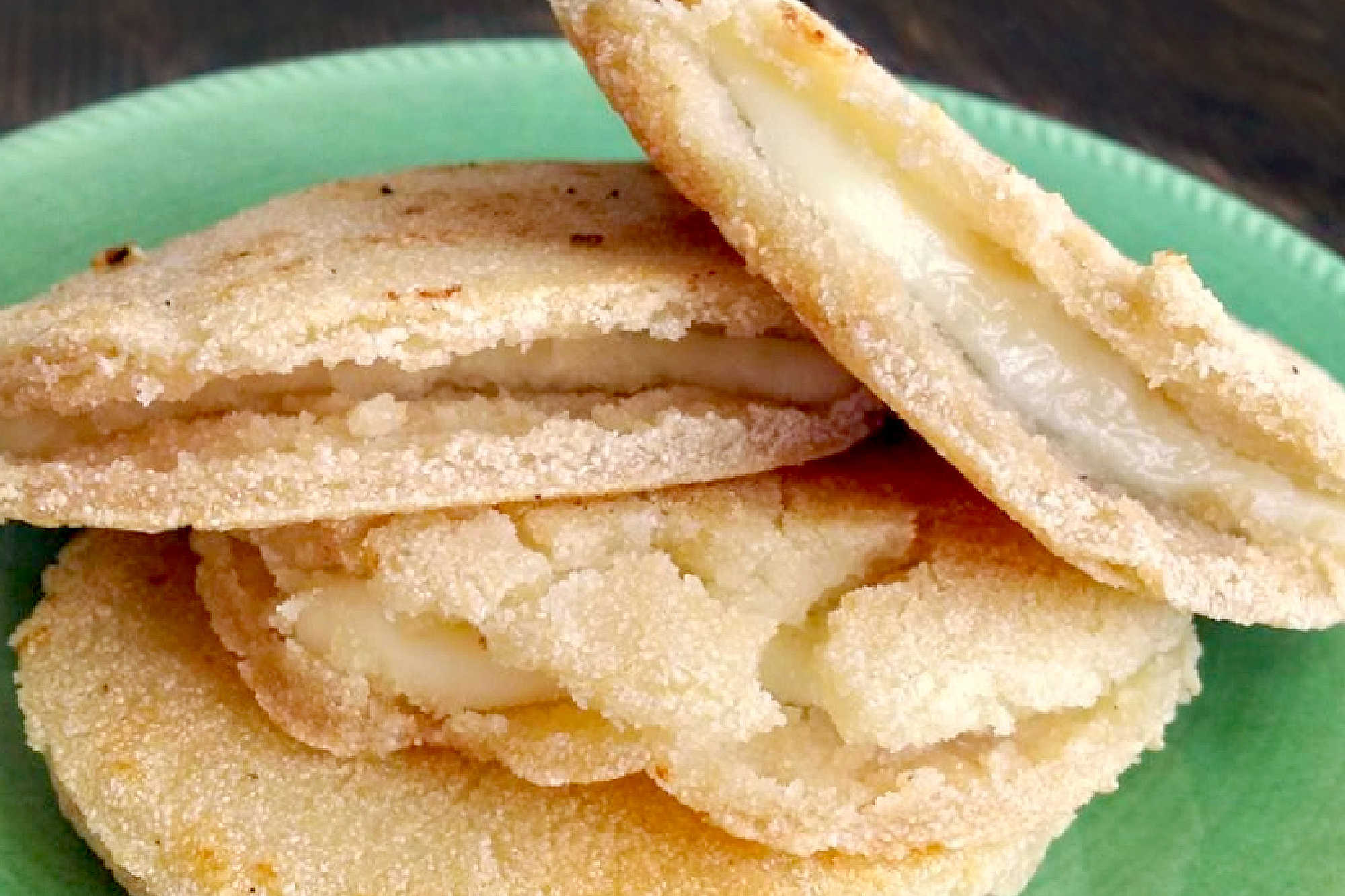 Golden and cheesy, arepas de queso are a true regional Colombian favorite. Enjoy the melt-in-your-mouth taste that brings tradition to your table. #Arepas #CheeseLovers #ComfortFood #ArepasDeQuesoDelight #ColombianCuisine #LatinFoodLovers #CheesyGoodness #FoodieFinds #ArepasDeQueso #ColombianFood #RegionalFavorites #SouthAmericanEats #CheeseLoversUnite