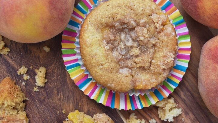 These muffins are filled with fresh summer peaches, topped with peaches, which makes them super-moist, fluffy, and almost sinful.