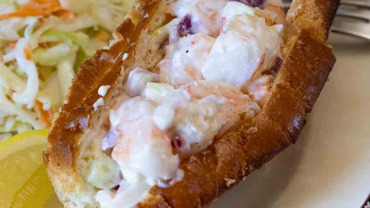 The classic New England Lobster Roll gets a budget friendly makeover in this fun and tasty Shrimp Roll sandwich.