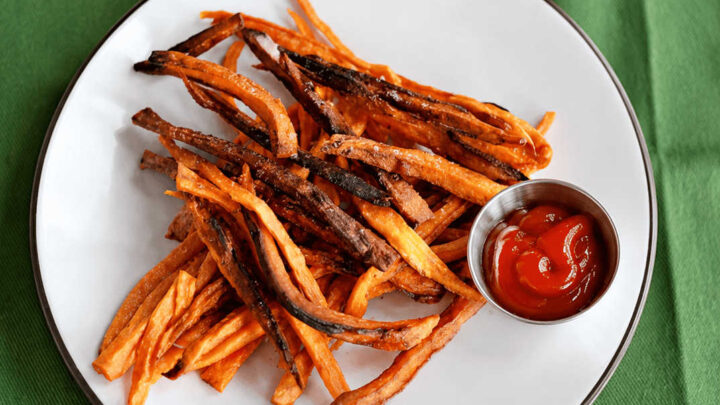 Crispy on the outside, tender on the inside, and perfectly seasoned, these Easy Sweet Potato Fries are a delicious side dish everyone will love!