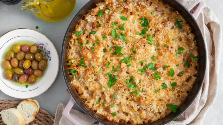 This easy Chicken Cordon Bleu Pasta Bake combines chicken, ham, Swiss cheese, and pasta in a creamy sauce with a crispy panko topping. Ready in 40 minutes.