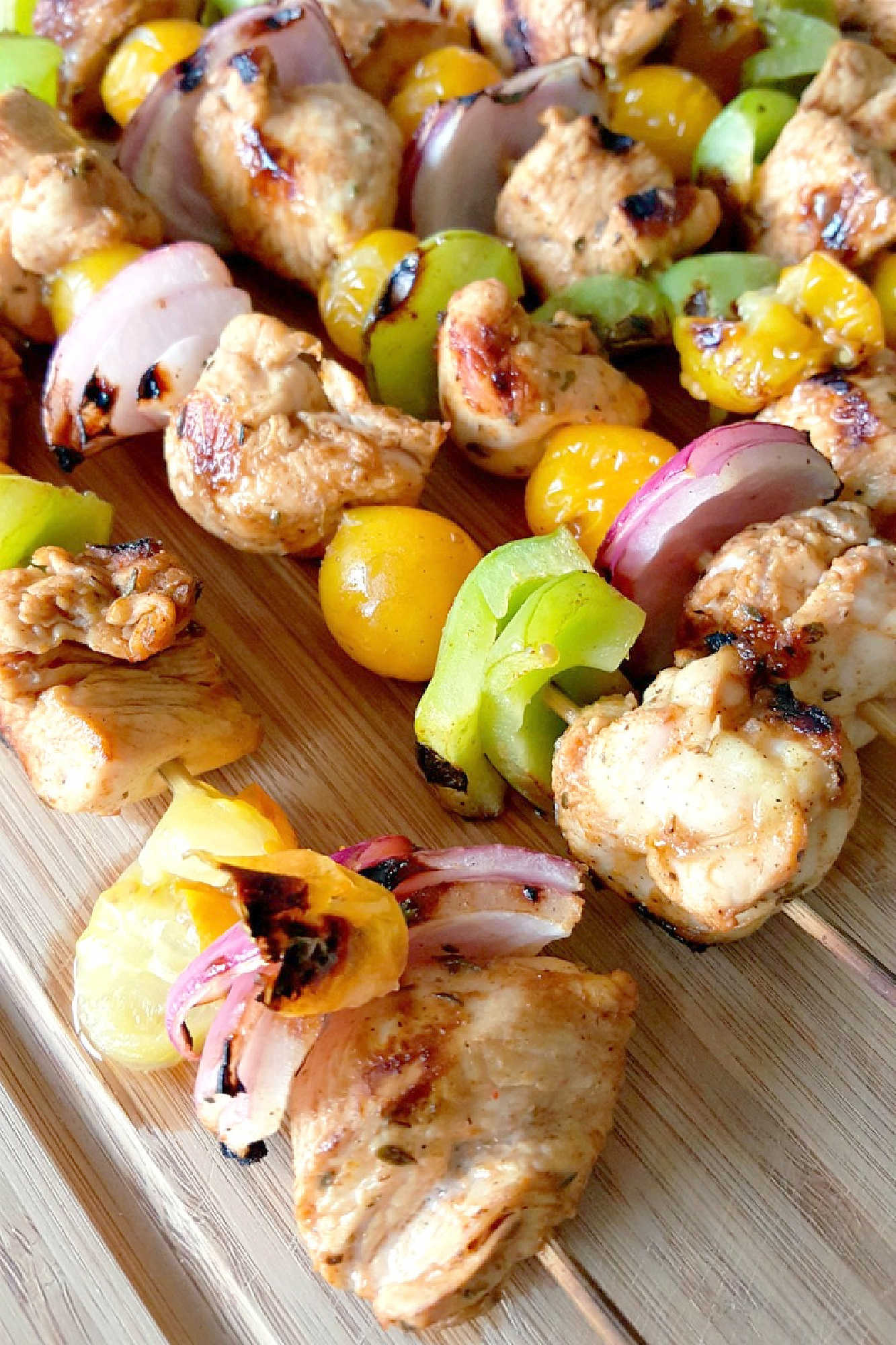 Fire up the grill for Chicken Fajita Kabobs loaded with juicy chicken, sweet peppers, onions, and bursty cherry tomatoes. Serve the smoky skewers with black bean and avocado salsa for a fresh, creamy, colorful Tex-Mex dinner that’s cookout ready and family approved. #ChickenFajitaKabobs #EasyGrillingRecipes #SummerDinner #ChickenKabobs #TexMexRecipes #AvocadoSalsa #FamilyMeals #OurFamilyTable