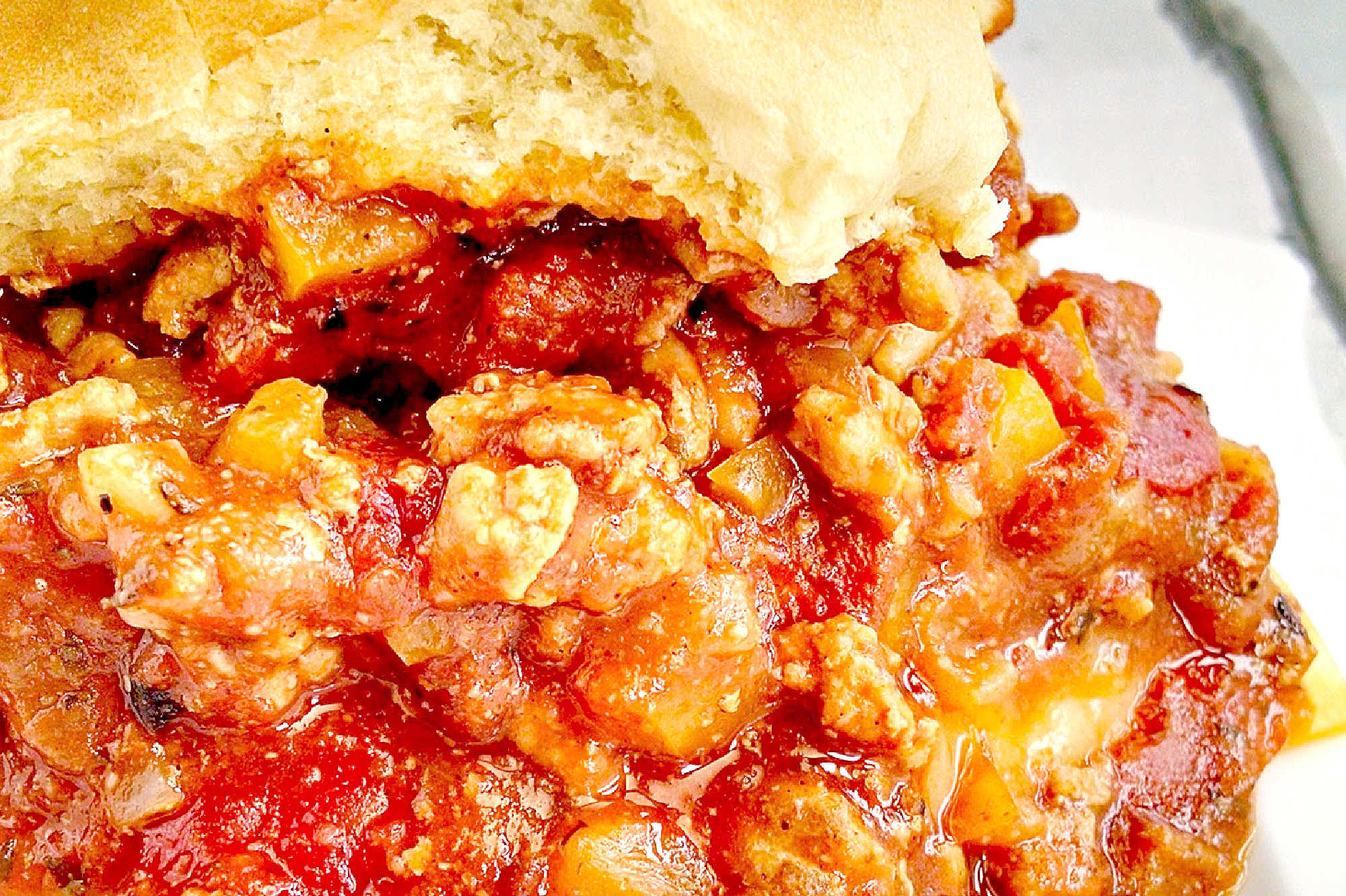 Bring bold skillet flavor to dinner with Chicken Fajita Sloppy Joes! Saucy, cheesy, pepper-packed, and perfect for busy weeknights when everyone wants something fun and satisfying. #OurFamilyTable #ChickenFajitaSloppyJoes #EasyDinner #WeeknightDinner #TexMexFood #FamilyMeals #ComfortFood #DinnerIdeas #Foodie
